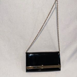 Steve Madden women’s black and gold shoulder bag